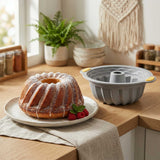 Pastry Tek Gray Silicone Kugelhopf / Fluted Bundt Cake Pan - Non-Stick, with Handles - 11 1/4" x 10 1/4" x 4" - 8 count box