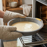 Pastry Tek Round Gray Silicone Cake Pan - Non-Stick, with Handles - 11 1/4" x 10 1/4" x 1 3/4" - 10 count box